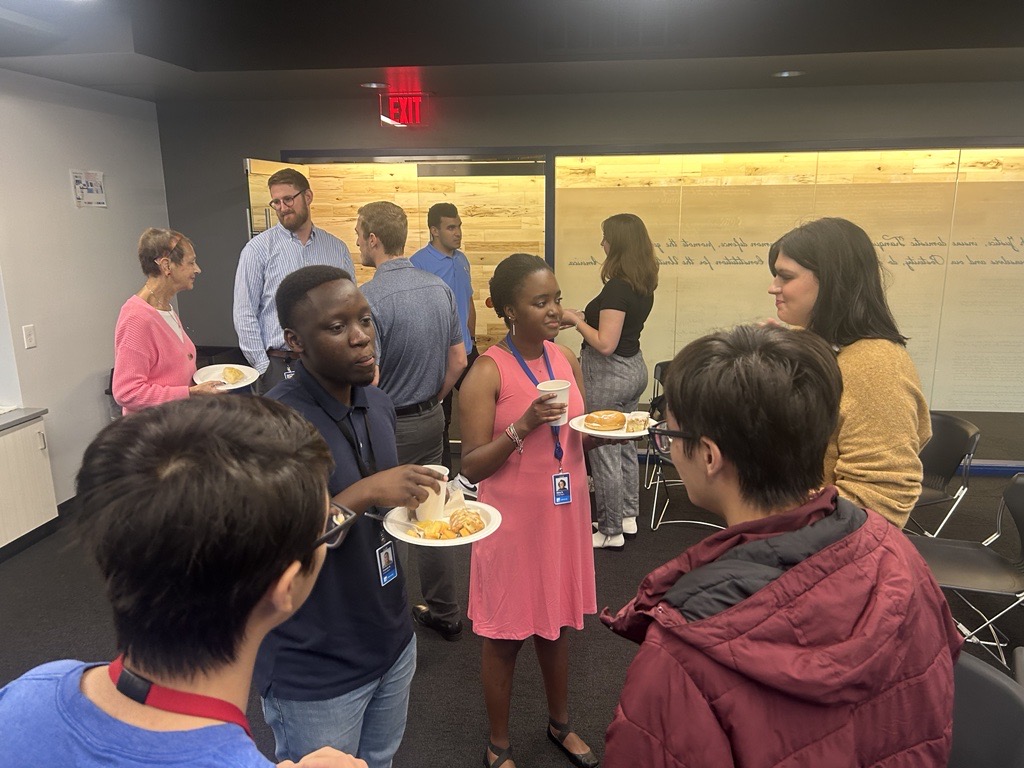 Election Systems &amp; Software employees gathered with the summer intern class for an open house breakfast to celebrate National Intern Day on July 27, 2023.
