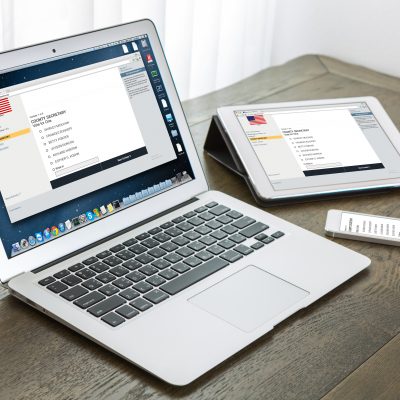 laptop with tablet and smart phone on table