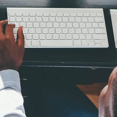 man with white keyboard