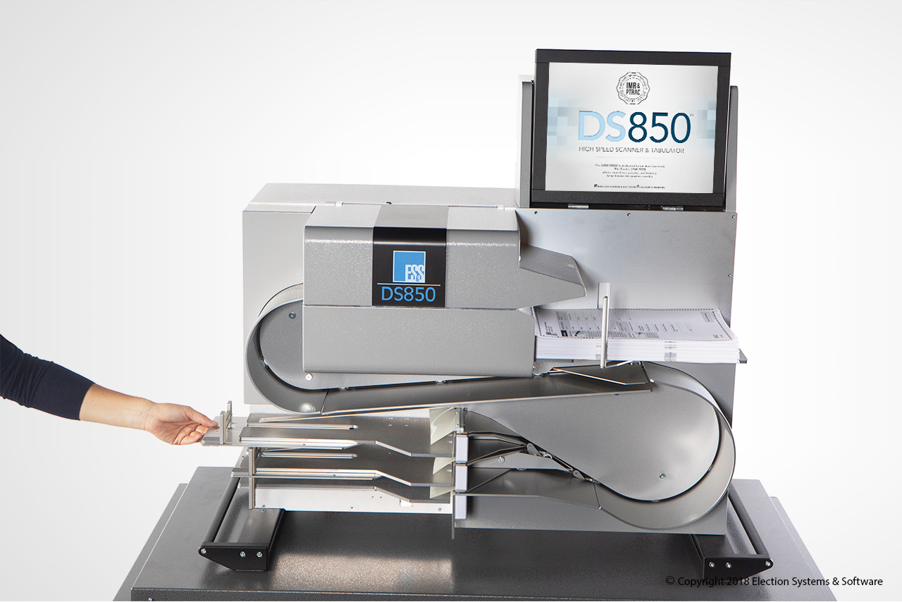 DS850 - Hand The DS850 High Speed Scanner and Tabulator Scans and Sorts Ballots