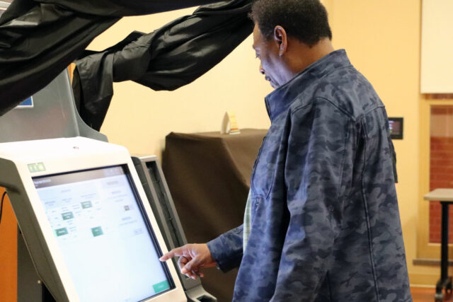 A local resident examines an ExpressVote XL during a public voting machine demonstration in March 2020, prior to pandemic restrictions. Photo courtesy of Cumberland County.