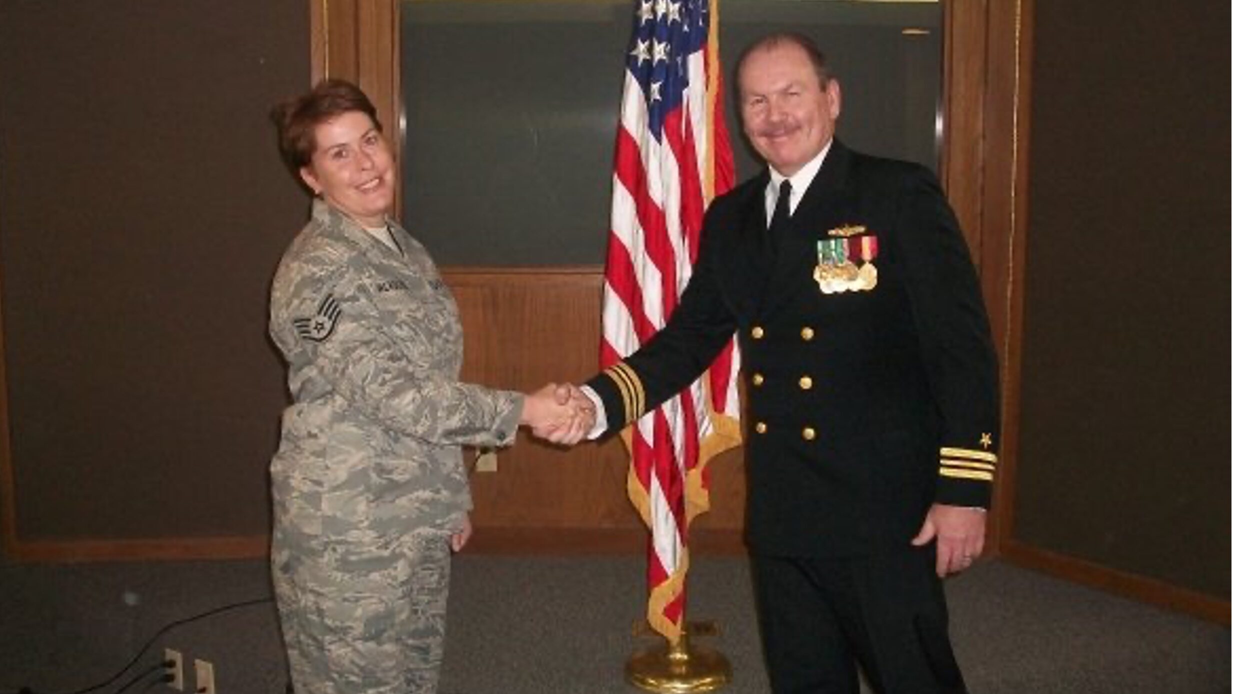 Wlaschin re-enlisting his spouse Pam in the US Air Force Reserve just before he retired from active duty.