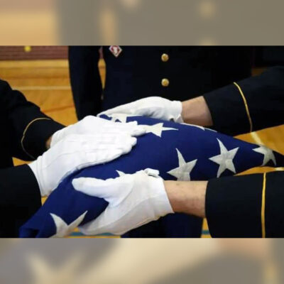 One Honor Guard member will present a folded United States Burial Flag to the next of kin.