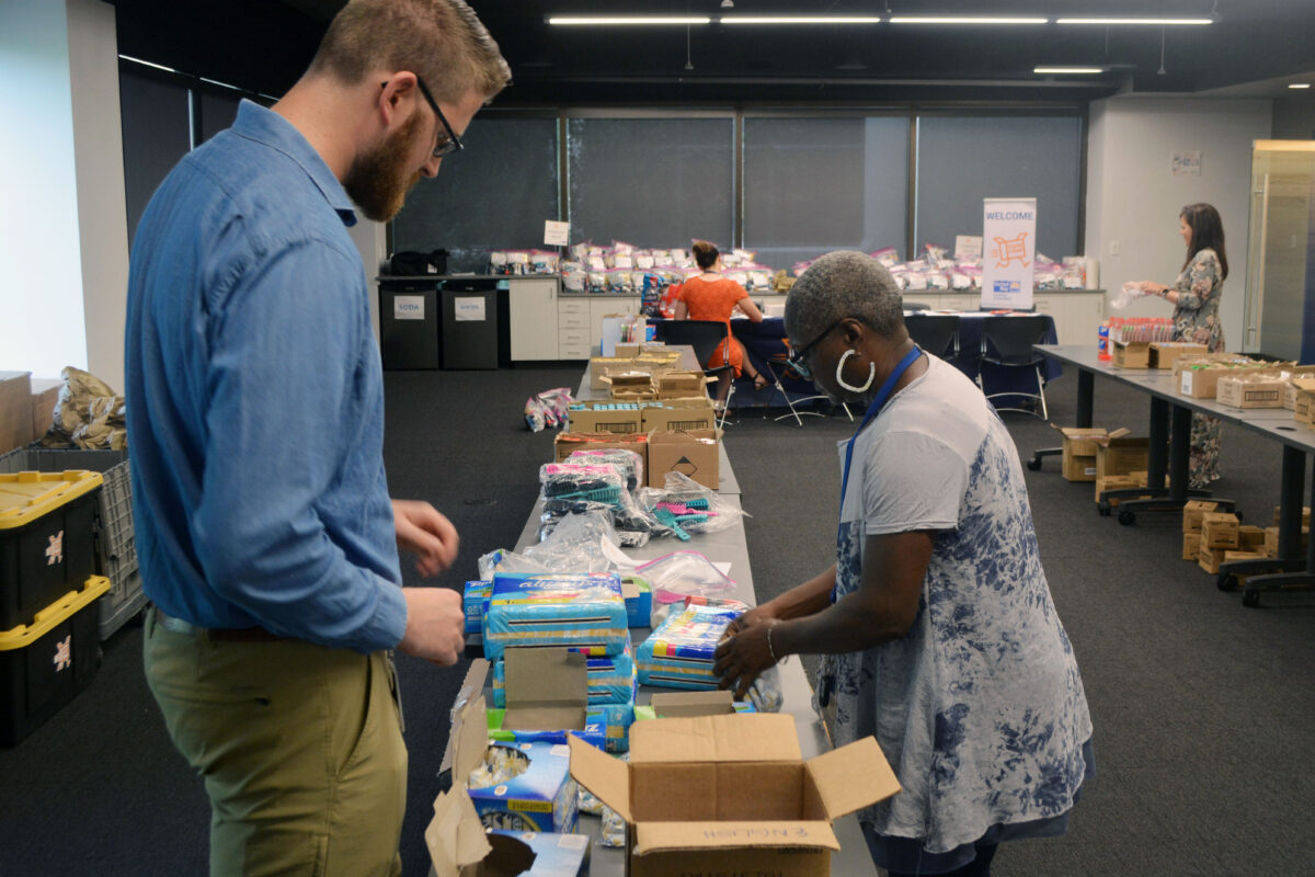 ES&S employees assembling hygiene kits at ES&S headquarters.