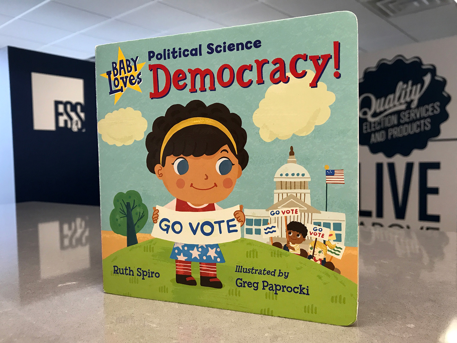 Photo of the book cover for "Baby Loves Political Science: Democracy!"