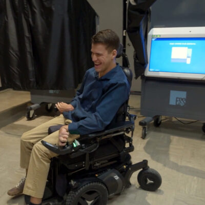 Blake, a voter with cerebral palsy, after using the ExpressVote XL