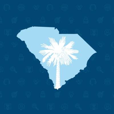 The shape of South Carolina with the palmetto from the state flag inset