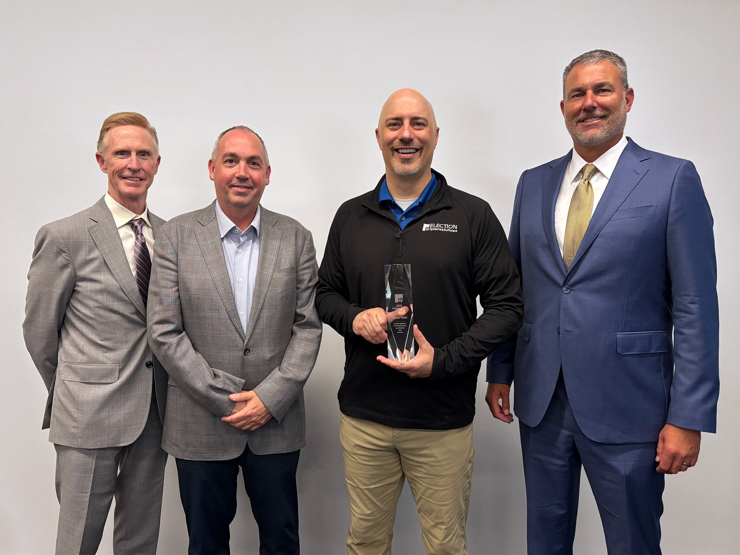 From left to right: EVP & CFO Tom O'Brien, SVP of Sales Mac Beeson, 2025 Chairman's Award Winner Tucker Omel, President & CEO Tom Burt