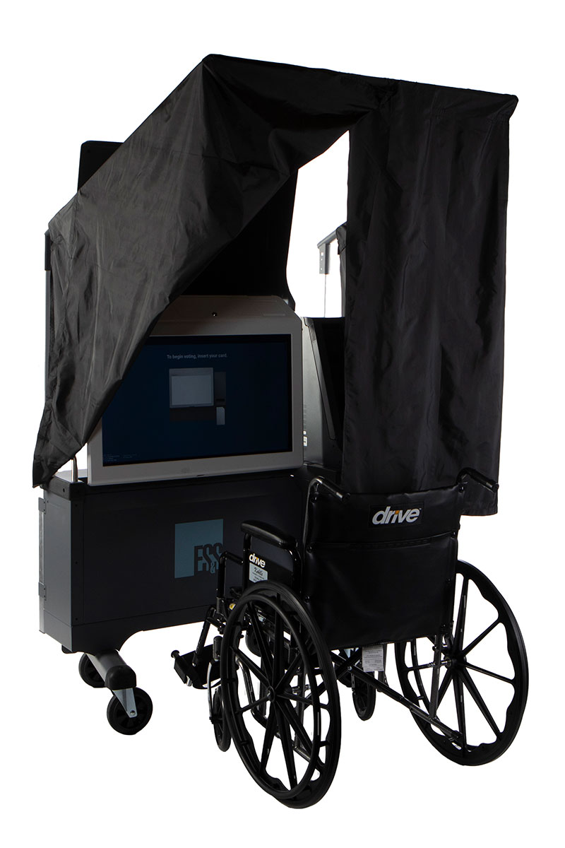 ExpressVote XL with privacy curtain ES&S' ExpressVote XL with its privacy curtain raised and positioned for maintaining privacy for a voter in a wheelchair.